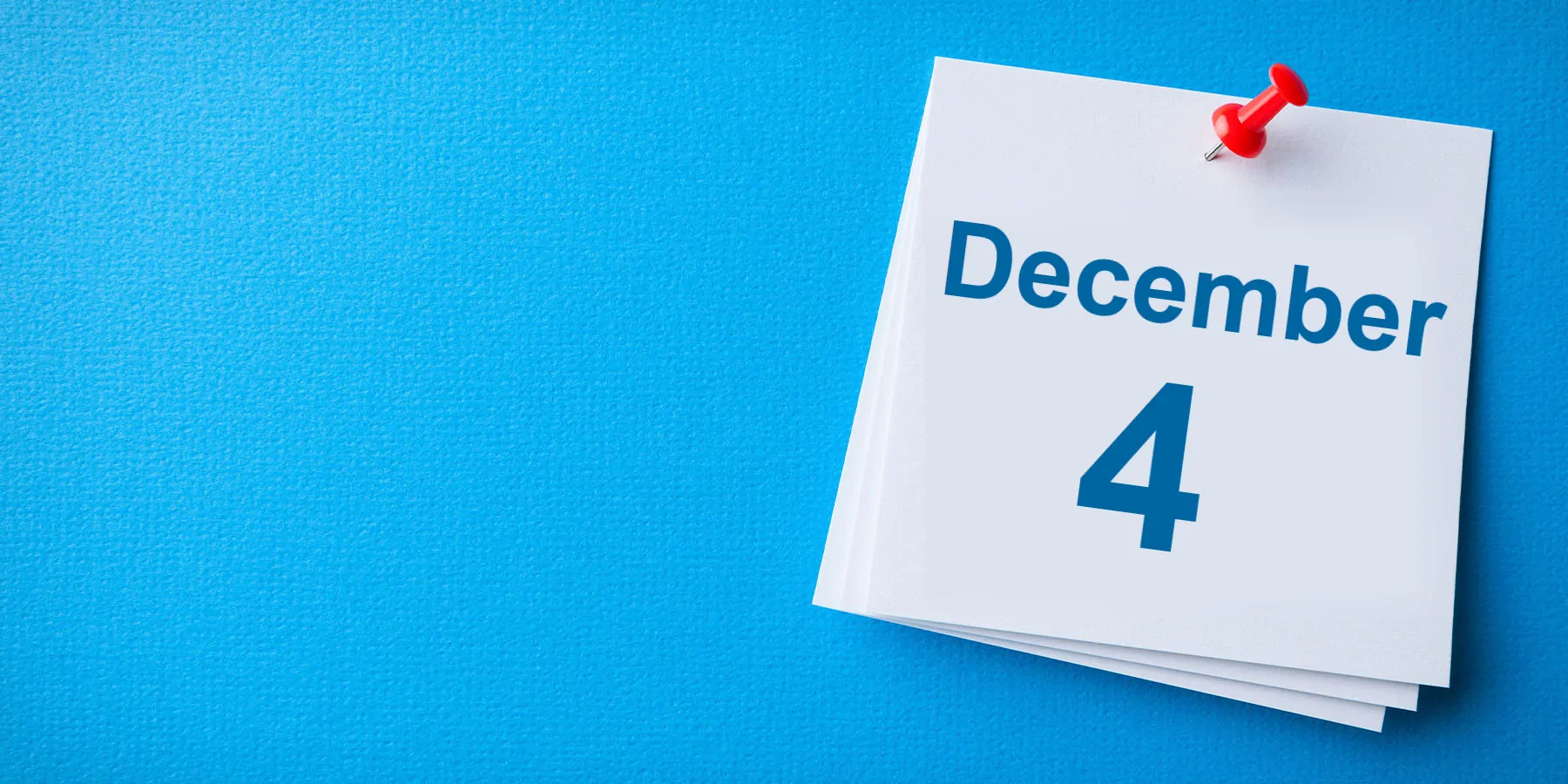 Illustration of a sticky note pinned to a blue background with the words, December 4, written on it.
