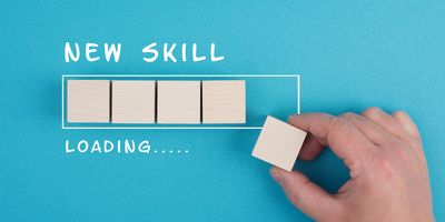 Illustration of a progress bar with the words, new skill loading, on a blue background.