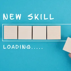 Illustration of a progress bar with the words, new skill loading, on a blue background.