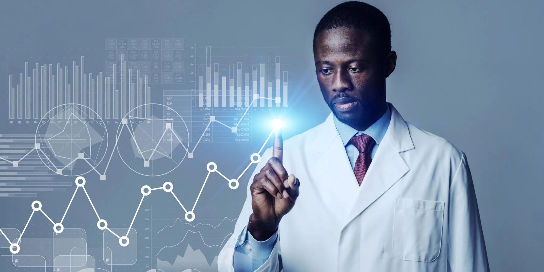 A researcher points to virtual projections of statistical data as graphs, plots, pie charts, and histograms.