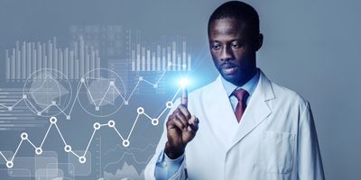 A researcher points to virtual projections of statistical data as graphs, plots, pie charts, and histograms.