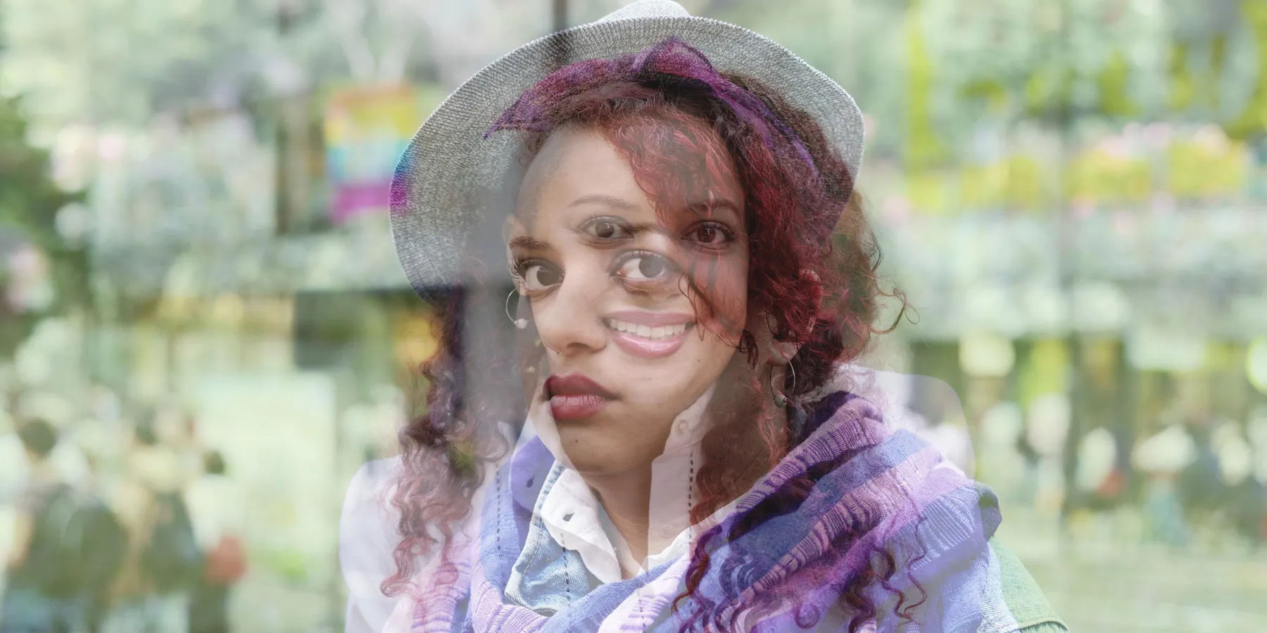 Multiple exposure image of a woman smiling and looking unhappy, indicating poor mental health.
