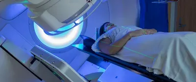 woman receiving radiation treatment for breast cancer