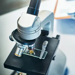 Microscope on a lab table, symbolizing cancer diagnosis