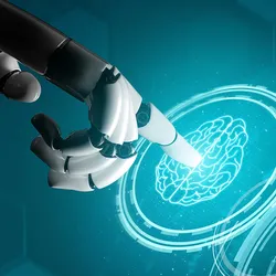 A robotic hand points to a virtual image of the human brain.