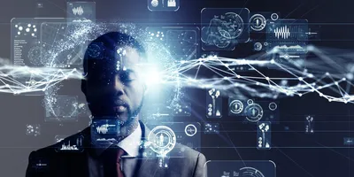Graphical vectors of medicine, health, automation, graphs, and bar charts float against a background of a man in a suit and tie with his eyes closed.