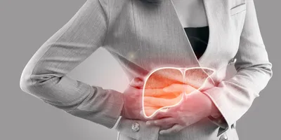 Illustration of a human liver on a woman's body as she holds the spot in pain with both hands.