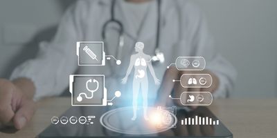 A graphical illustration of a clinician pointing to a vector of a human body, vaccine, stethoscope, brain, lungs, kidneys, and heart. 