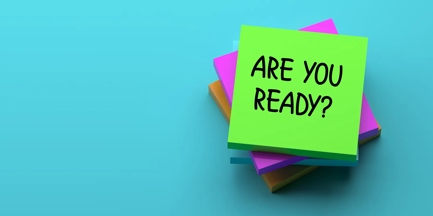 Photo of a sticky note that reads “Are you ready?” on a blue background.