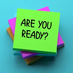 Photo of a sticky note that reads “Are you ready?” on a blue background.