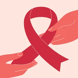 A vector illustration of one hand passing a red ribbon to another as a symbol of AIDS awareness.