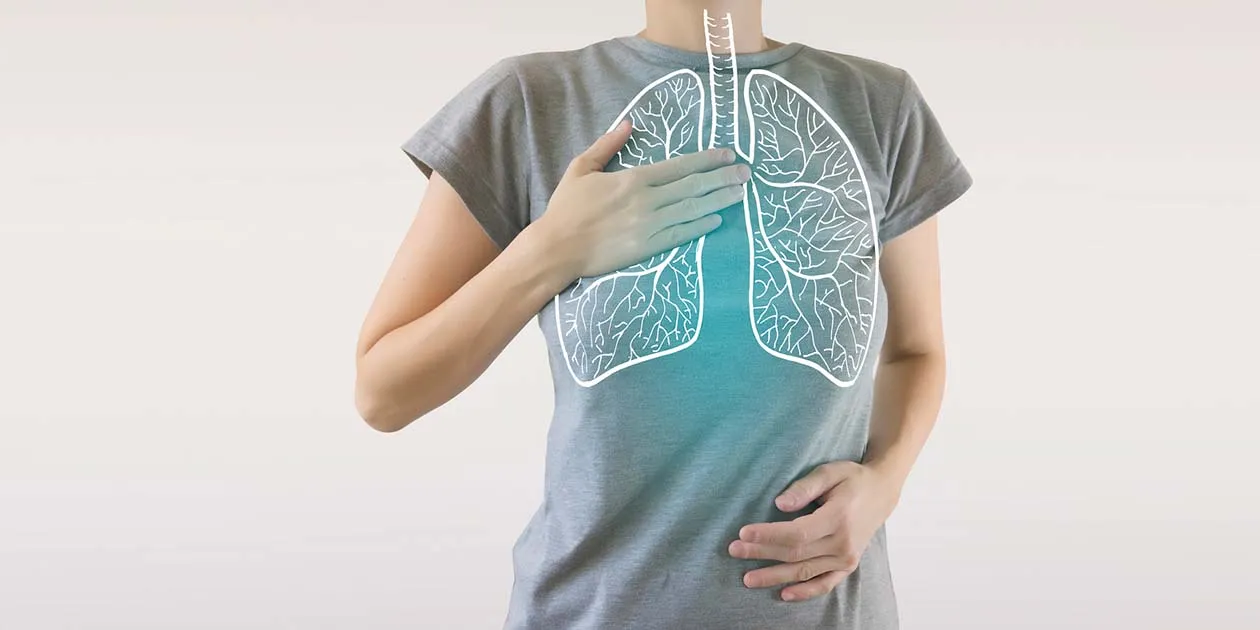 Person breathing with holographic image of lungs overlayed