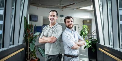 Photo portrait of Dr. Edward A. Curtis, head of the Functional Potential of Nucleic Acids research group (left), and Martin Volek, PhD student in Edward Curtis Group, IOCB Prague.