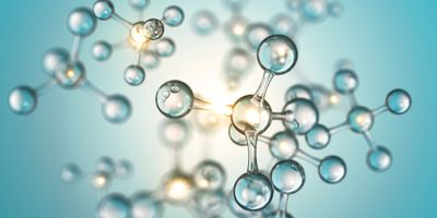 Illustration of a transparent molecular structure against a blue background representing the chemical technique bioconjugation.