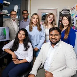 Researchers at The University of Texas at El Paso have made significant inroads in understanding how nanoplastics and per- and polyfluoroalkyl substances (PFAS)—commonly known as forever chemicals—disrupt biomolecular structure and function. Their findings are described in two recent articles in the Journal of the American Chemical Society and ACS Applied Materials and Interfaces. The research team includes (top row, L-R): Mahesh Narayan, PhD, professor and chief of the Division of Biochemistry in UTEP’s Department of Chemistry and Biochemistry; Randhal Ramirez Orozco, doctoral student of computational science; Sophia Borrego, sophomore biomedical sciences major; Samantha Arce, sophomore biomedical sciences major; Daisy Wilson, doctoral student of environmental science and engineering; (bottom row, L-R) Ummy Habiba Sweety, doctoral student of environmental science and engineering; and Jyotish Kumar, doctoral student in the Department of Chemistry and Biochemistry. Lela Vukovic, PhD (not pictured), associate professor in the Department of Chemistry and Biochemistry, was also involved in the research.