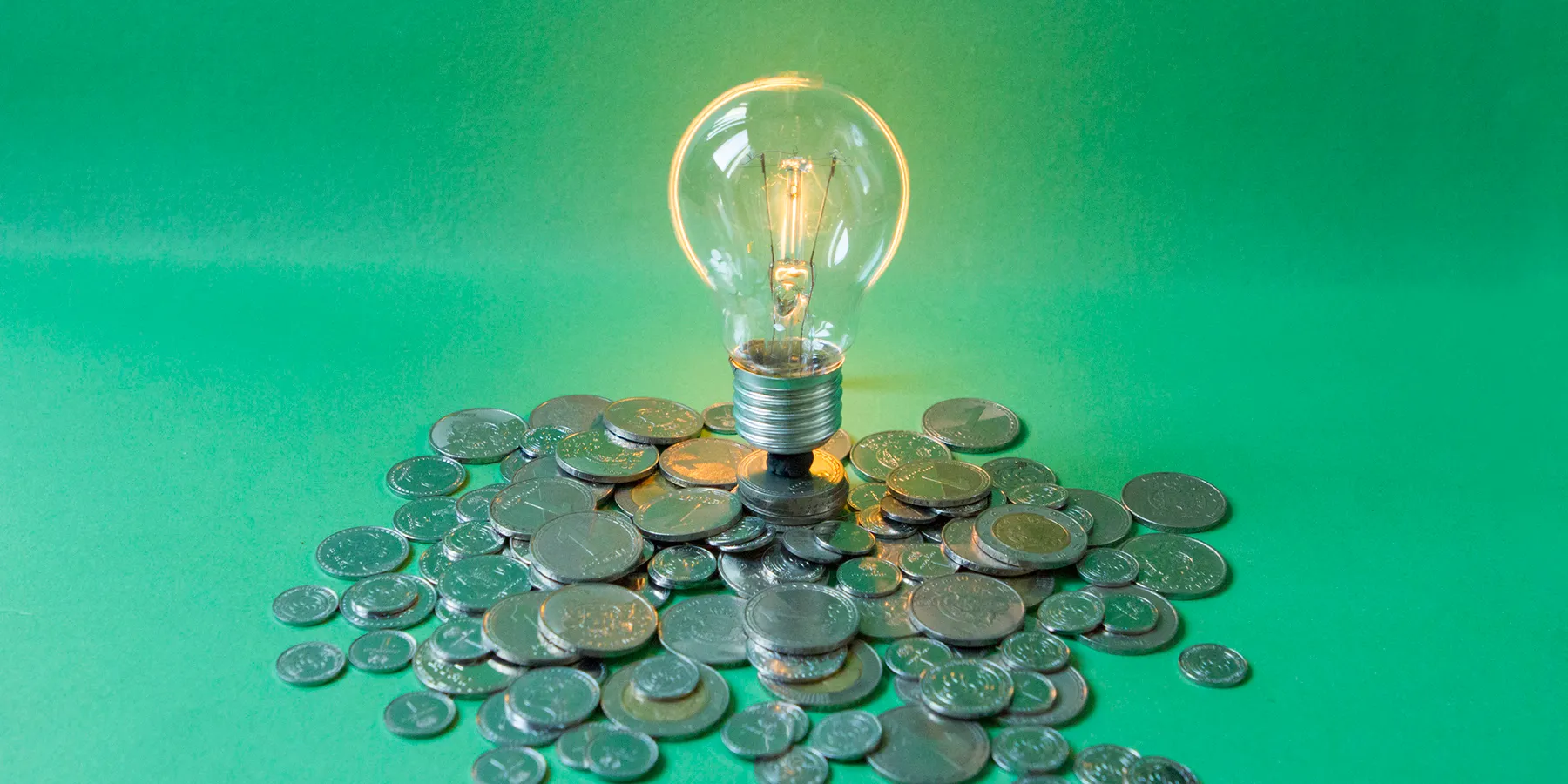  Image showing coins surrounding an idea lightbulb. The Laboratory Integration Strategic Association is leading an effort to crowdsource LDT development in reaction to FDA regulations.