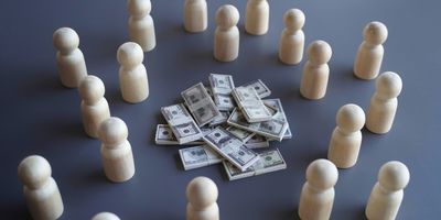 Image of pegs surrounding money. Crowdfunding assays for UTIs are the initial offering from LISA in response to the FDA’s LDT final rule.