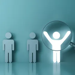 Illustration of several people standing in a line with a magnifying glass hovering over one of them.