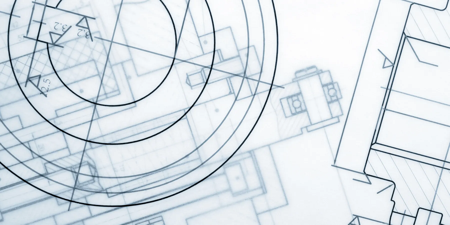 Photo looking down at different laboratory design blueprints.