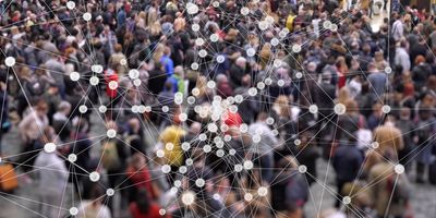 A photo of a crowd of people overlaid with a network of connecting lines to represent data analysis in human clinical research.