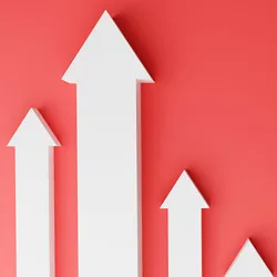 Illustration of four white arrows pointing upwards against a red background to represent the estimated rise in global breast cancer mortality and incidence.