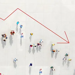 Photo looking down at a crowd from above outlined by a red arrow falling downwards like on a chart to represent the cutting of science and research funding in the US.