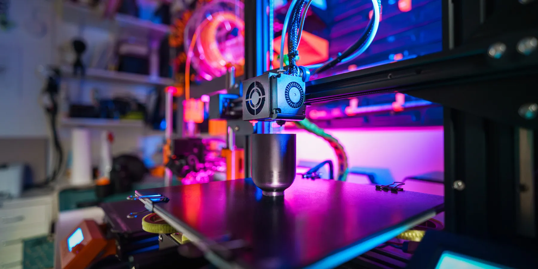 Photo of a 3D printer in a research laboratory printing a biotech medtech clinical device.