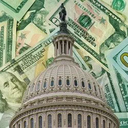 Photo of the US Congress building with US dollar bills in the background to represent recent tariff war in the US and global trade.