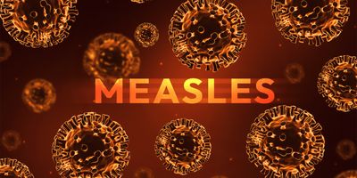 Illustration of the measles virus particles with the word 'measles' in bold against an orange background.