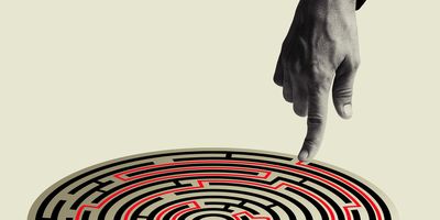 Illustration of a lab professional tracing a path in a data maze with their finger.