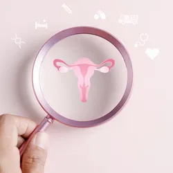 Magnifying glass focusing on a uterus symbol, representing HPV self-collection.